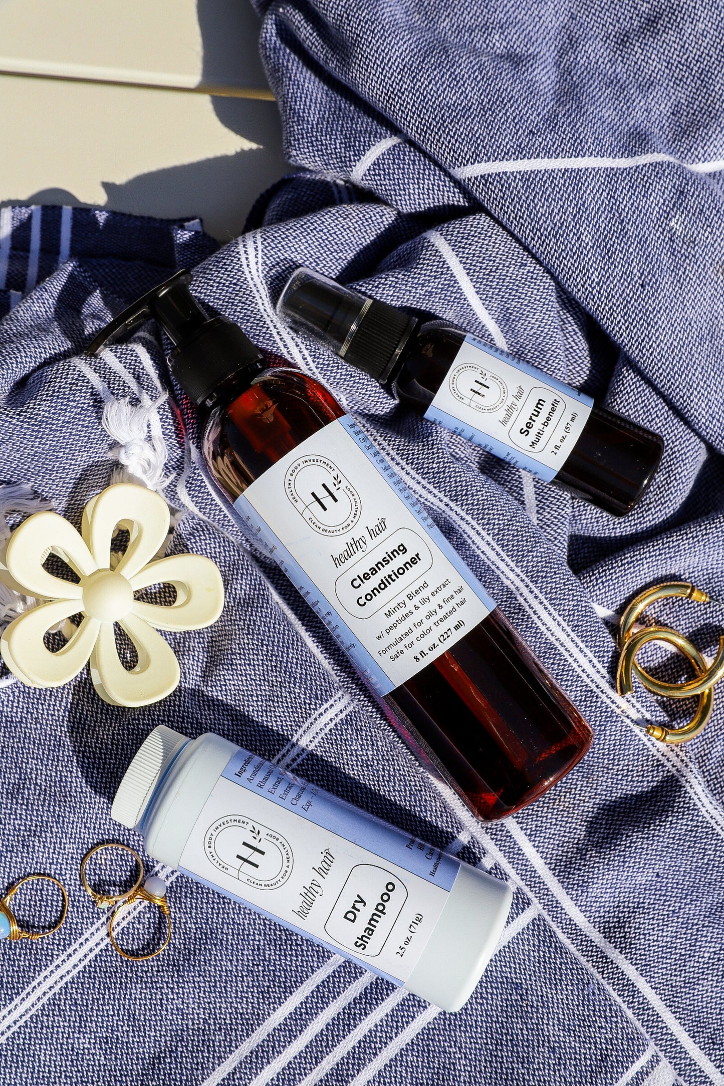 Hair care bundle featuring shampoo, conditioner, and styling products for healthy, shiny, and smooth hair.